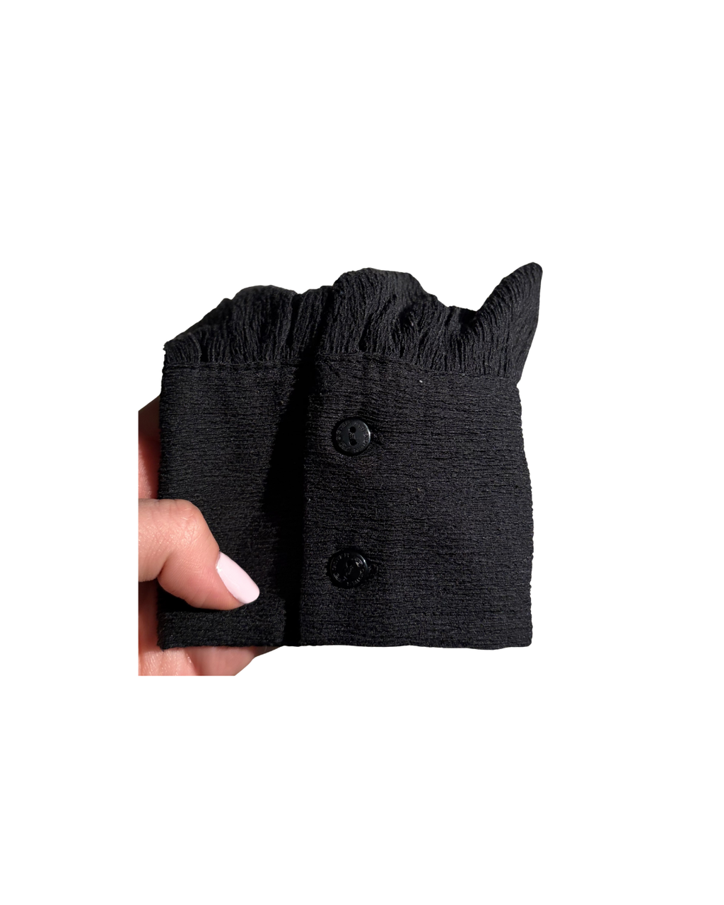 black crepe crop top with corset-like detail on bust